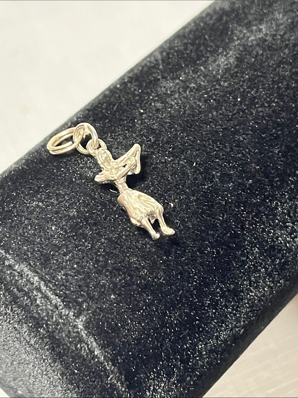 Silver-tone hula dancer charm pendant. Vintage.